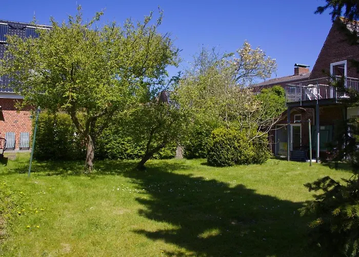 Dom wakacyjny Inselblume 28 - Mit Garten In *